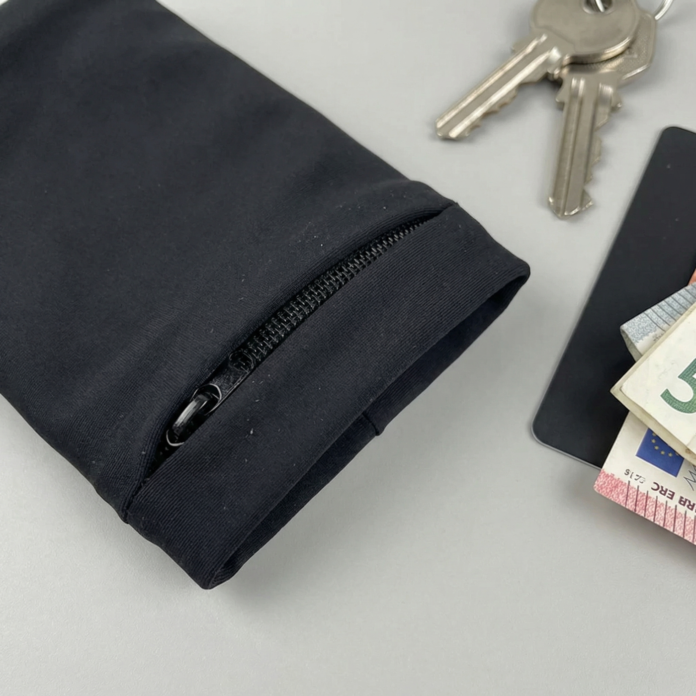 Lauf-Handgelenktasche sicherer Verschluss für Schlüssel und Karten – Packungsinhalt | Helvio